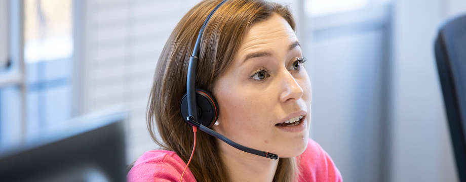 Customer agent on phone to customer
