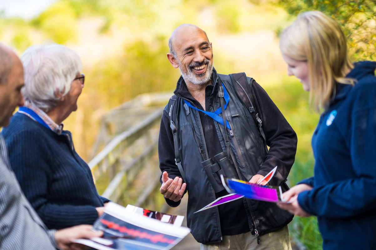 Volunteer shares findings with team members