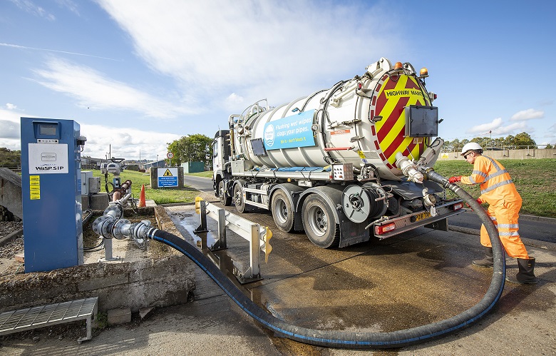 A man with a cess tanker