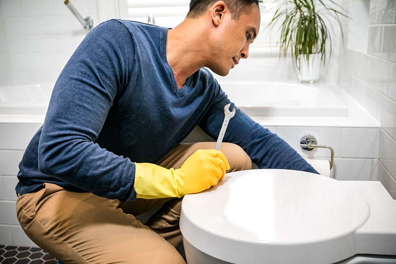 Toilet being fixed