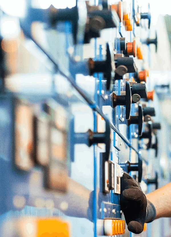 technician operates motor control panel 4800X1200